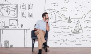 Image of a man sitting and thinking