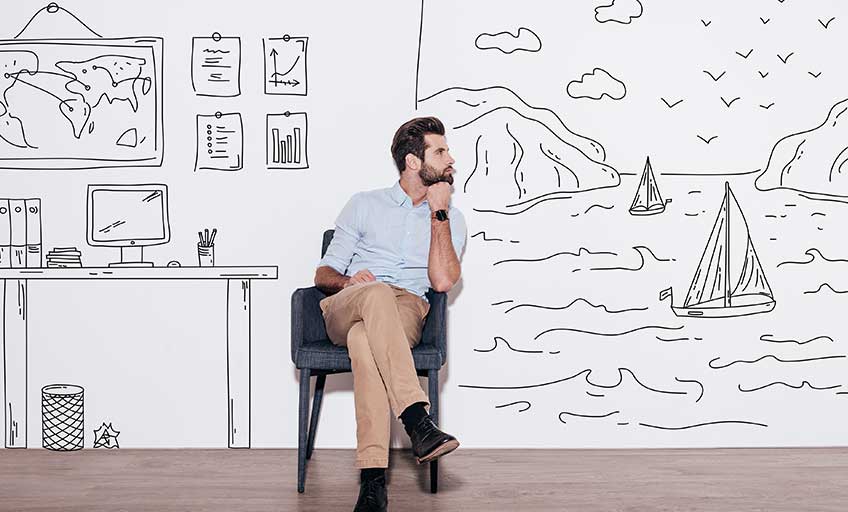 Image of a man sitting and thinking