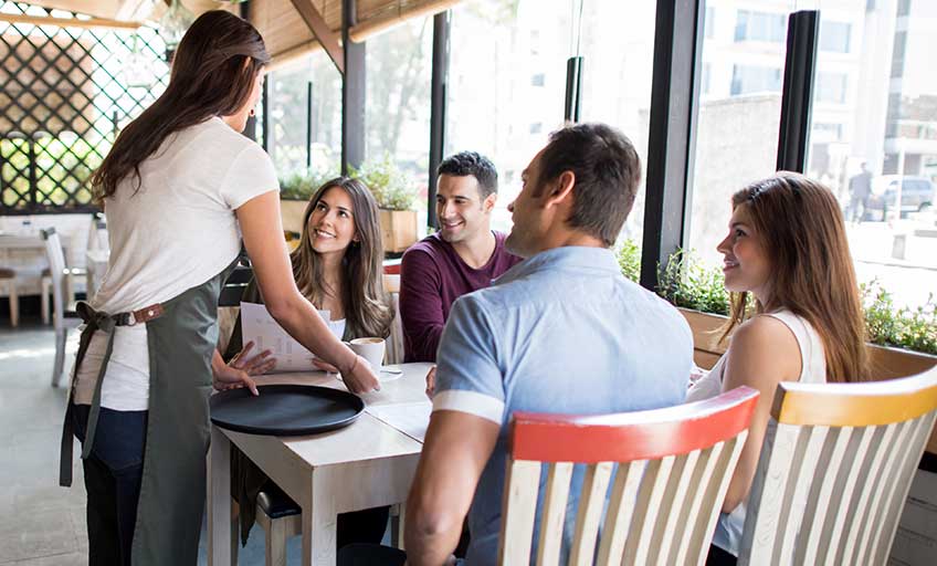 A group of people in a restaurant