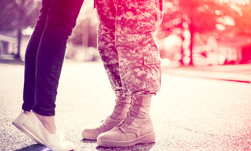 Two people standing on the road