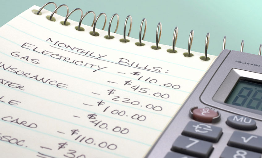 An image of a notebook and a calculator