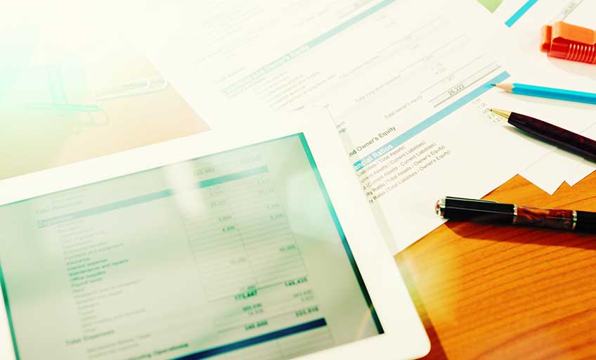 Close-up view of a tablet on a desk