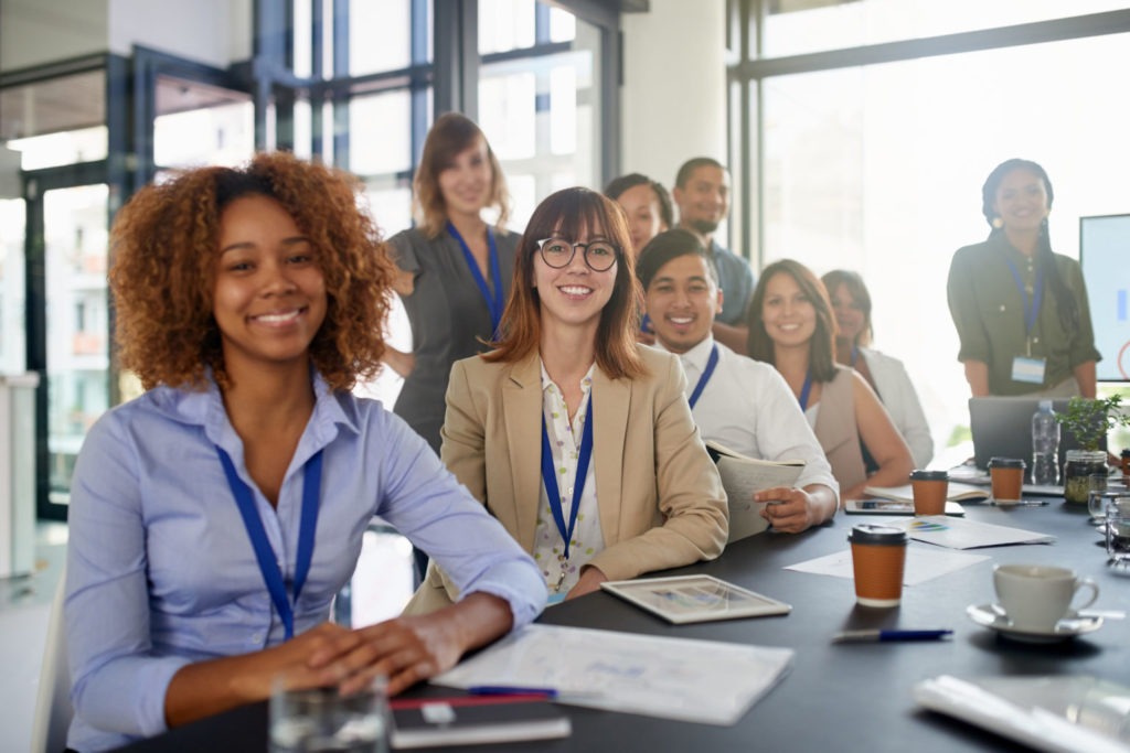 A group of people networking in a professional setting