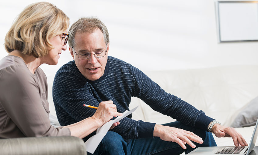 An image of an older couple discussing