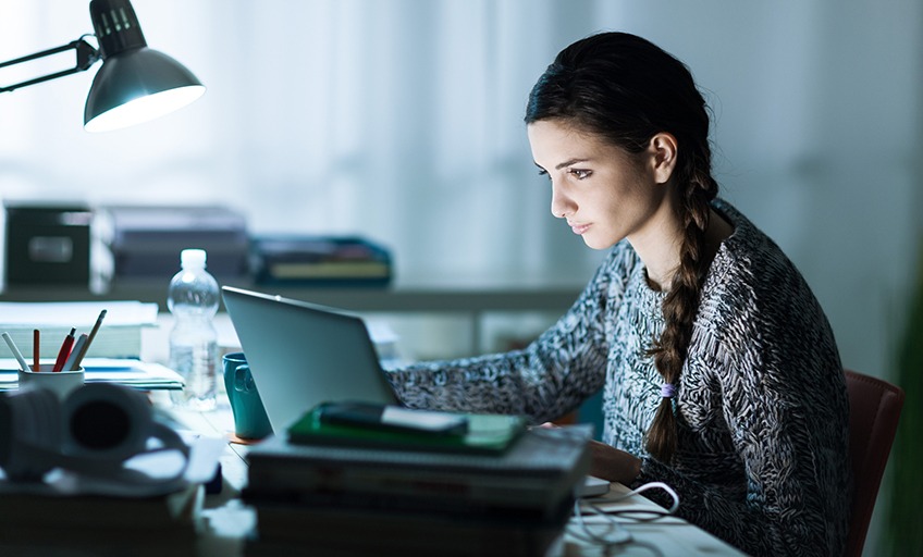 Woman concerned at computer