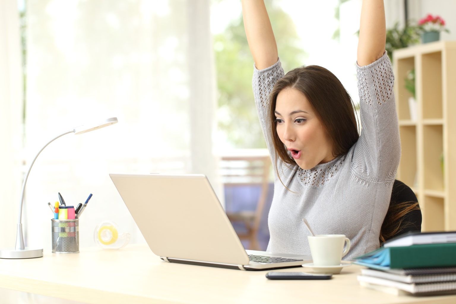 Euphoric and surprised winner winning online Euphoric and surprised winner winning online