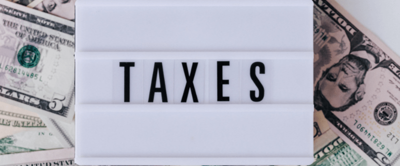 Image of currency and tax documents