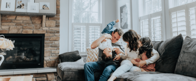 An image of a family chatting together